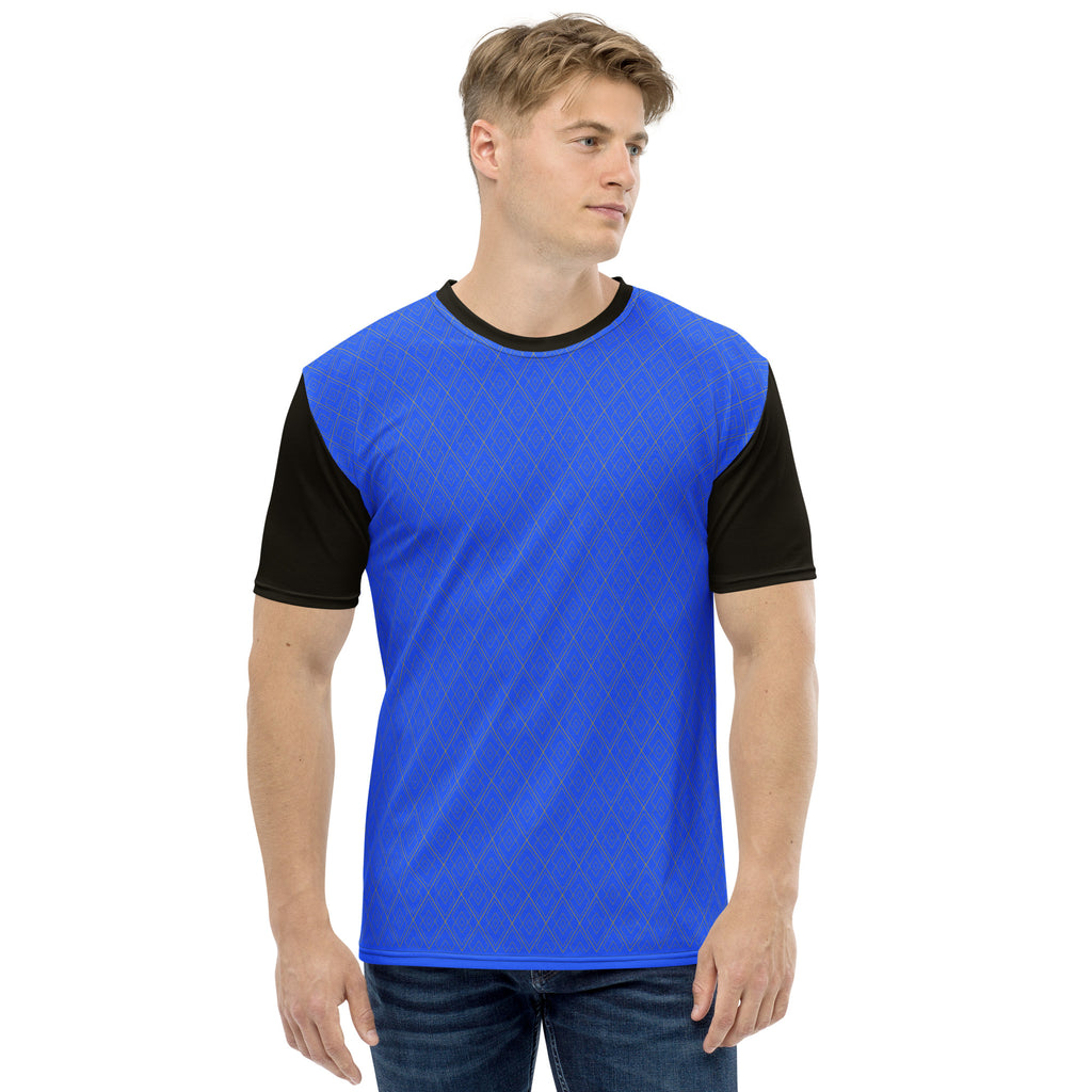 Man wearing a blue and black patterned shirt on a white background