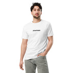 Man wearing a white t-shirt with text "DIFFERENT WORLDS" on a white background