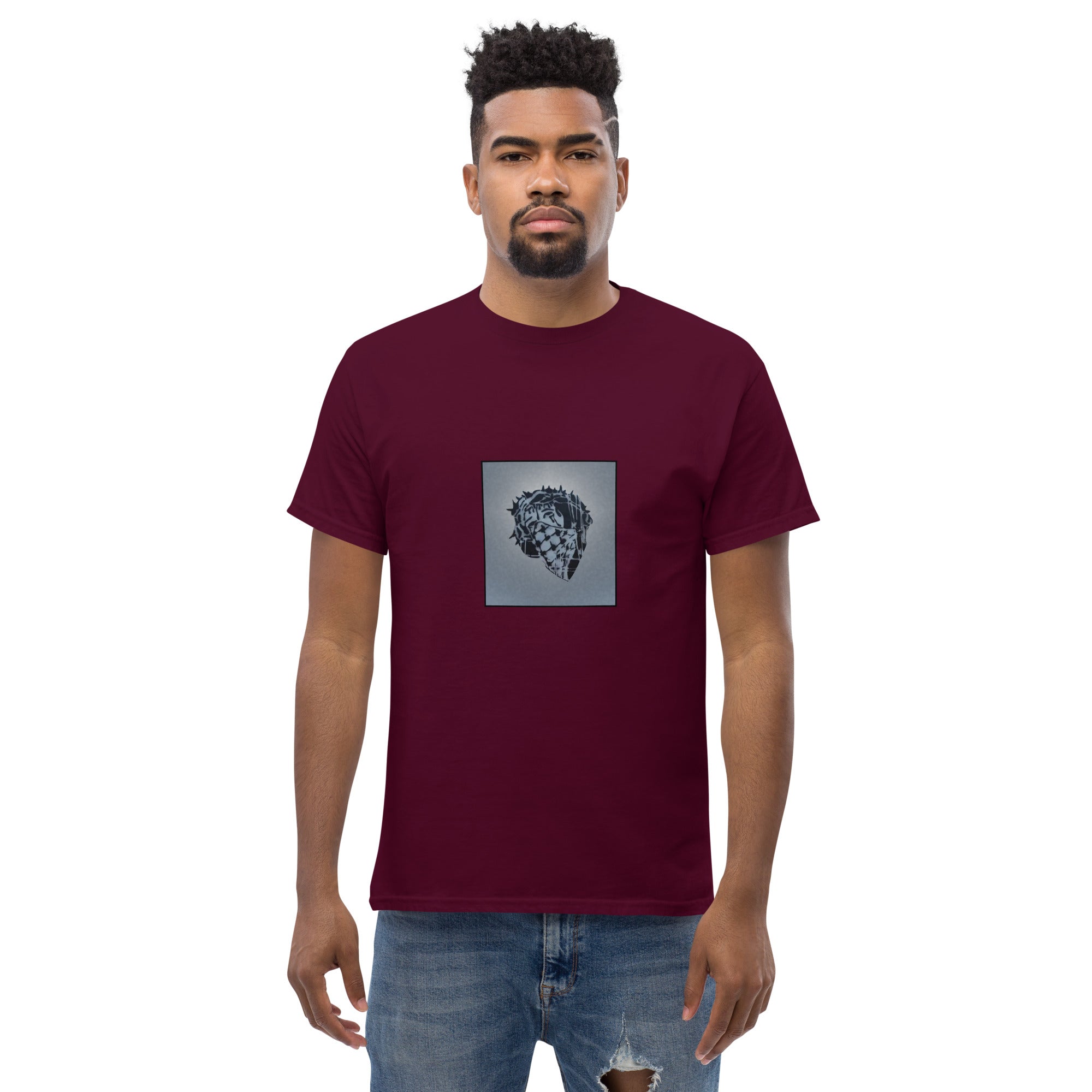 Man wearing graphic jesus maroon t-shirt