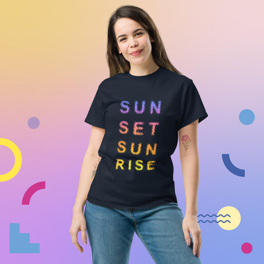 Woman wearing a navy t-shirt with colorful text on a gradient background